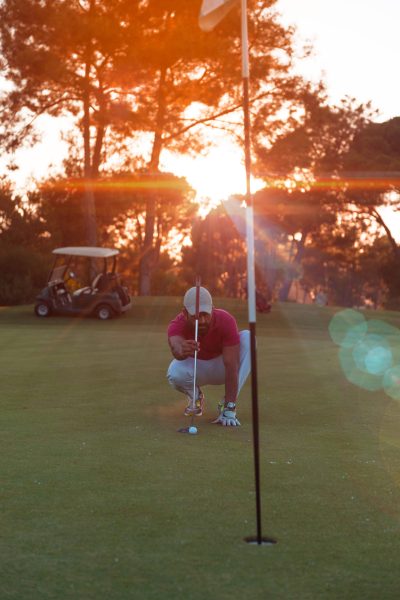Golfer at Bobby Jones Golf Course near Wildwood where routine HVAC maintenance keeps nearby homes comfortable.