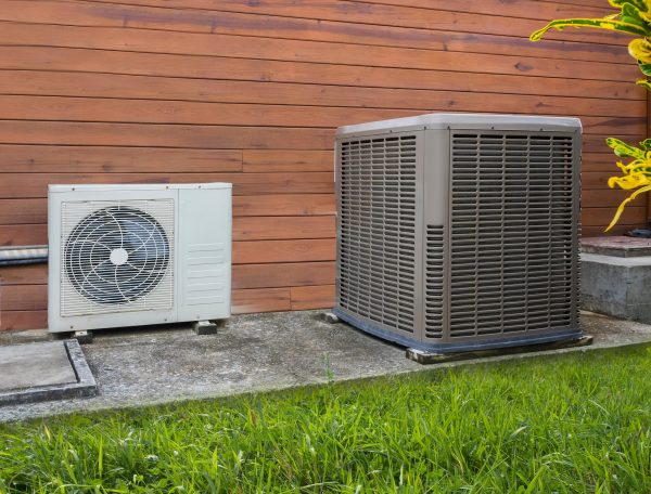 Heat pump and central air conditioner at an Atlanta home ready for professional HVAC maintenance and seasonal service.